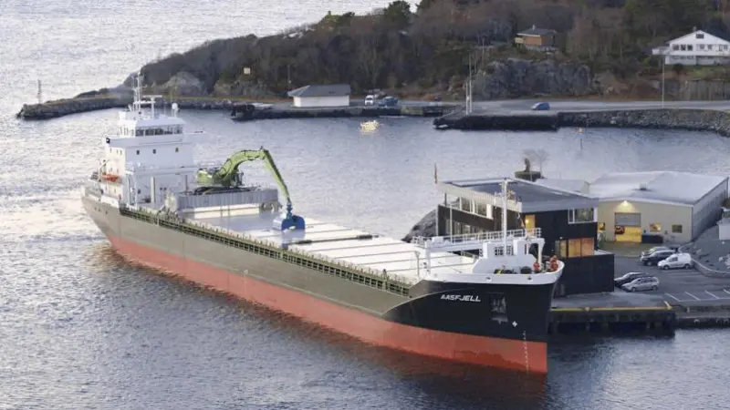 Excavator-fitted minibulker Aasfjell at Mosterhamn, the owner’s base.