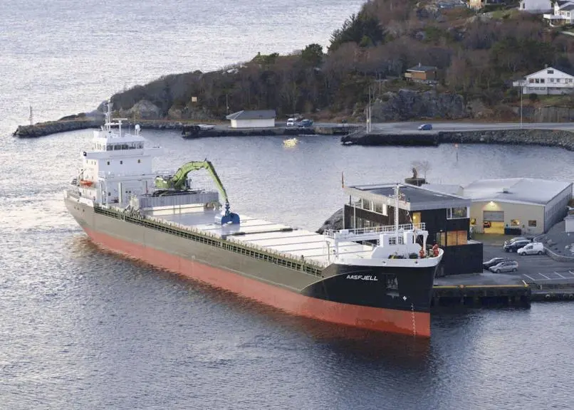 Excavator-fitted minibulker Aasfjell at Mosterhamn, the owner’s base.