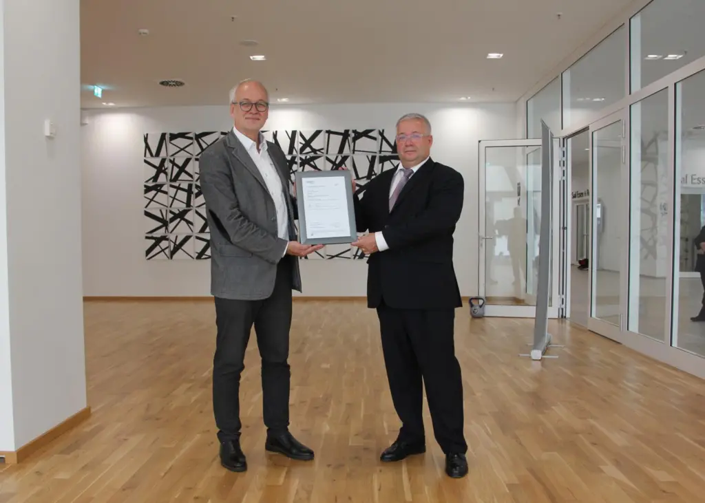 The Type Approval certificate is presented to Dr. Martin Schmitz-Niederau, voestalpine Böhler Welding Germany GmbH (left) by Norbert Worm Principal Welding Engineer, Materials & Welding at DNV