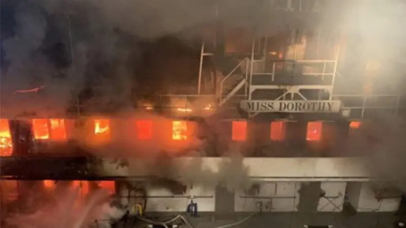 Starboard side of the Miss Dorothy during firefighting efforts from the towing vessel Christopher Wilson.