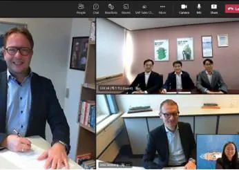 The digital signing brought together representatives from MAN Energy Solutions and STX HI.