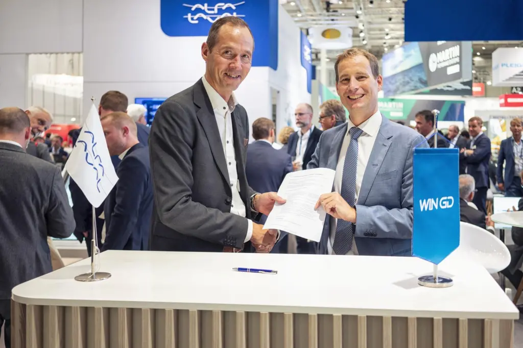 Peter Nielsen, President, Marine Separation & Heat Transfer Equipment, Alfa Laval & Dominik Schneiter, Vice President R&D, WinGD at the signing of a new joint programme agreement at SMM 2022 Hamburg, Germany
