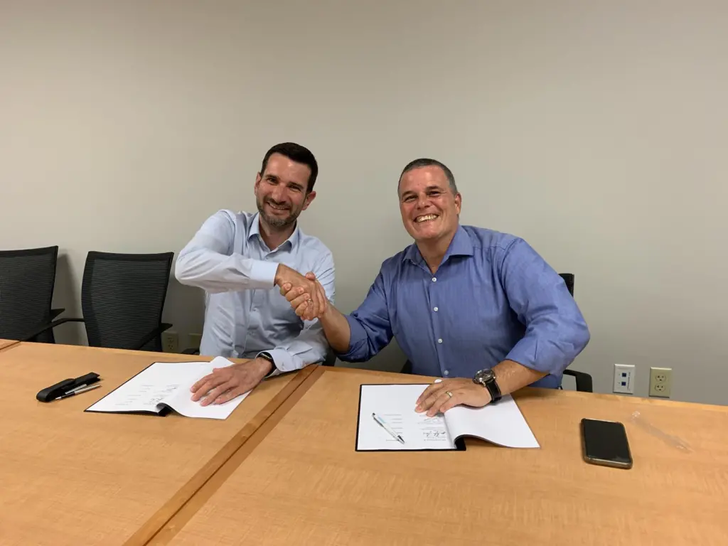 Bernd Siebert (left) – Head of Retrofit & Upgrades – pictured signing the MoU on behalf of MAN Energy Solutions with Giovanni Canu – Vice President Energy Assets and Fleet Decarbonization, NCL