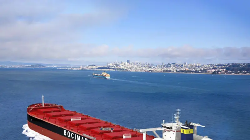 A rendering of a CMB bulk carrier operating on ammonia as a fuel.