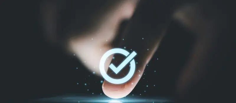 Digital image of finger pressing a tick
