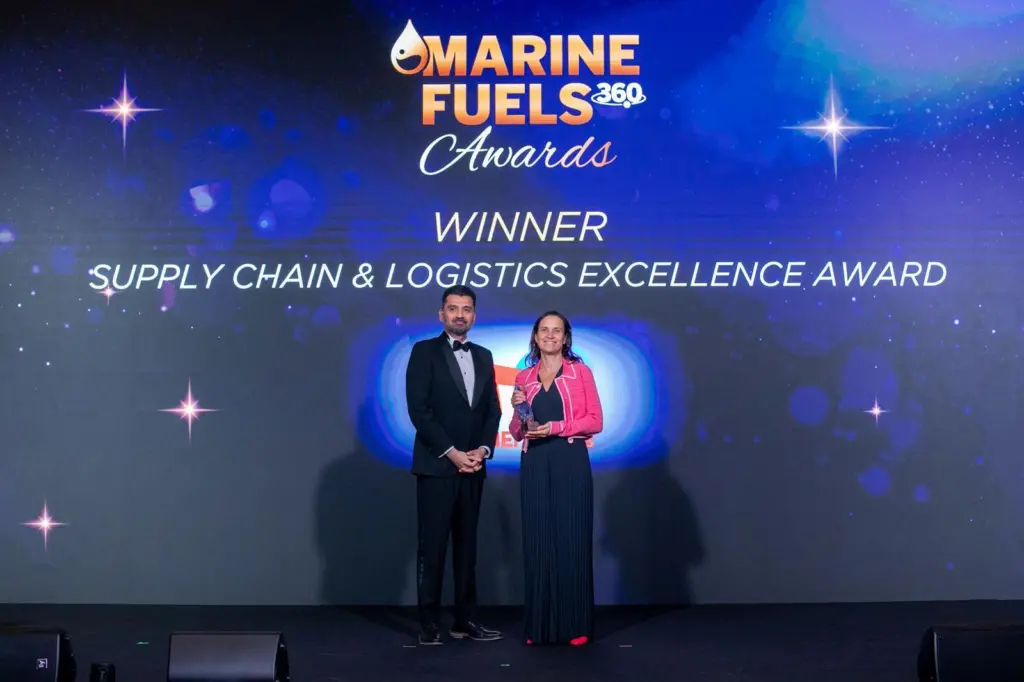 Louise Tricoire, vice president of TotalEnergies Marine Fuels, accepts the award from Sukuma Verma, MD for the Maritime & Energy Portfolio of Informa Markets