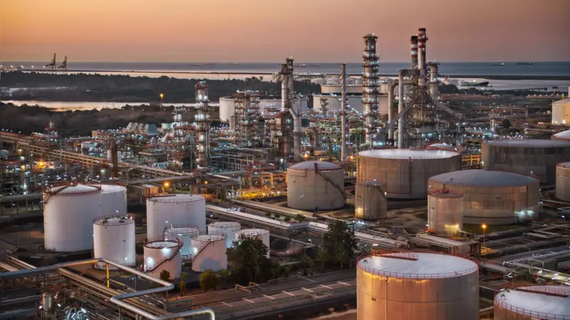 The image shows the Cepsa Rábida Energy Park with Huelva Port in the background