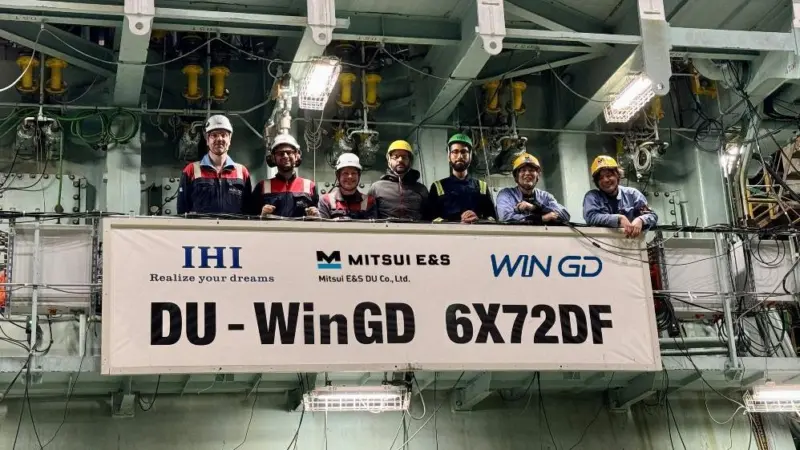 Members of the WinGD and CMA CGM test team onboard a vessel
