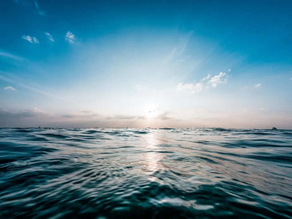 seascape with blue sky and sun