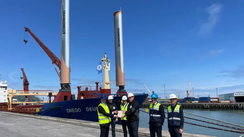 The image shows the Onego Deusto equipped with its new eSAILs moored at the Bilbao quayside