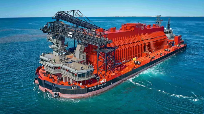 The photo shows “MinRes Coolibah” and “MinRes Airlie” commenced transhipping operations in May 2024