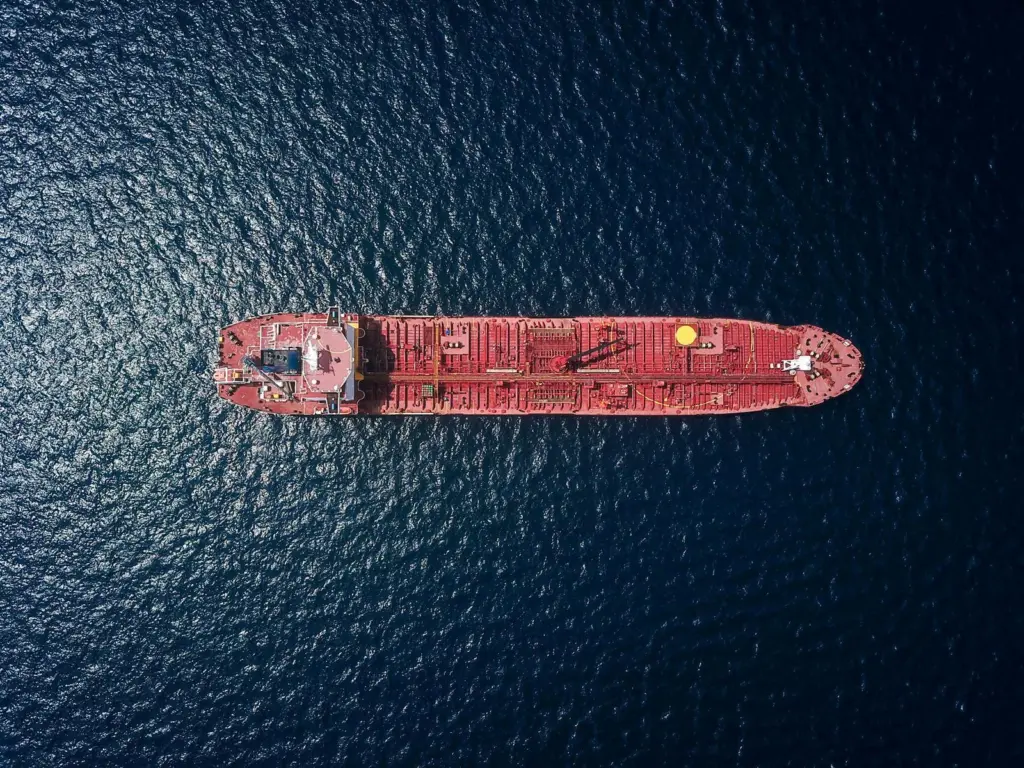 Image of a red tanker at sea