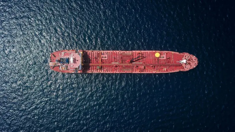 Image of a red tanker at sea