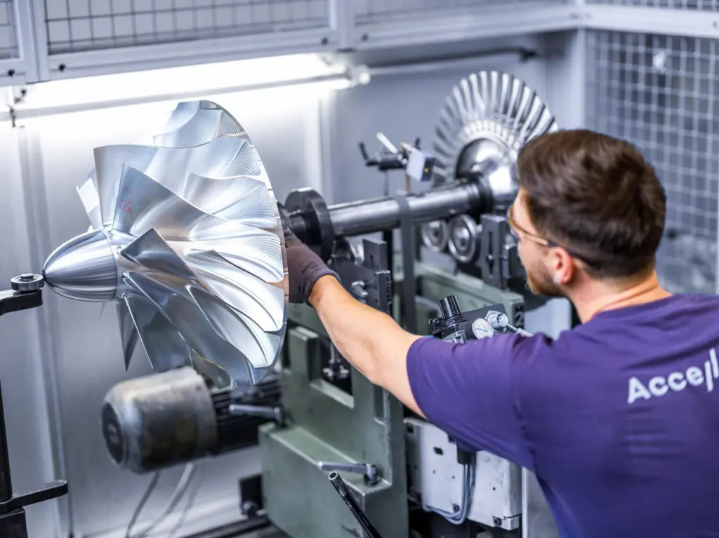 Man building an Accelleron turbocharger