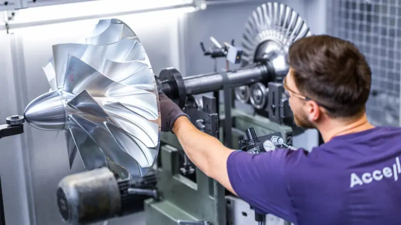 Man building an Accelleron turbocharger