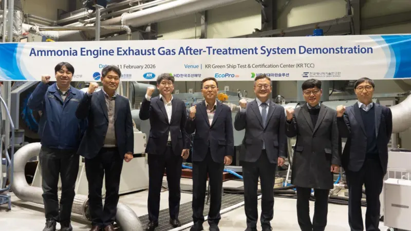 A photo of the development partners smiling for the camera