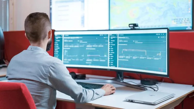 Man sitting at a computer screen