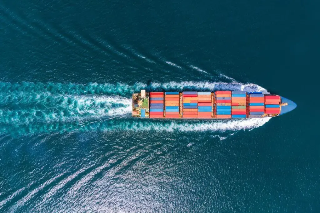 Overhead image of a container ship at sea