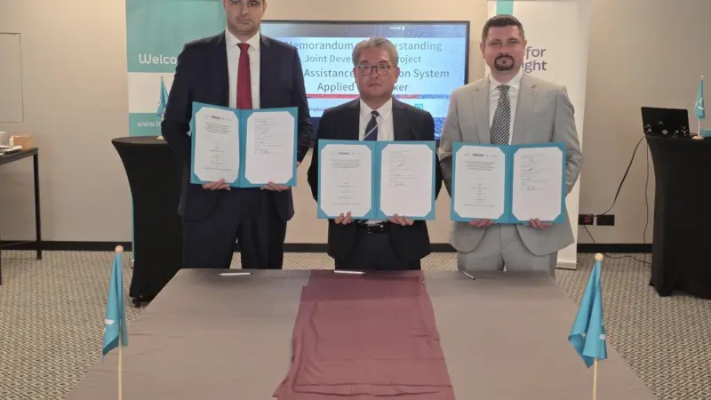 Employees of LR, K Shipbuilding and Liberian Registry at an MoU signing to develop wind propulsion for MR tankers